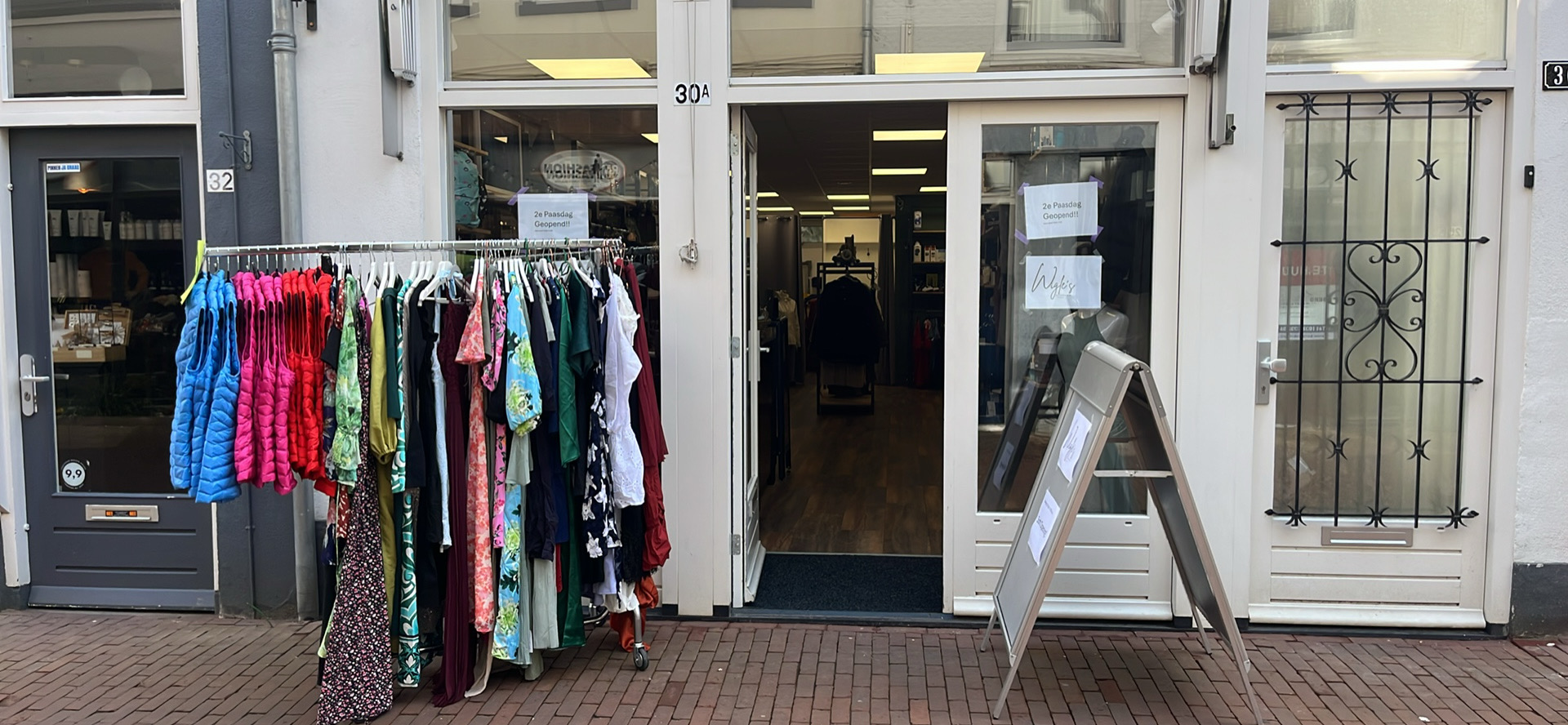 This image depicts stacked vintage books on a windowsill, featuring a cluttered but identifiable layout.